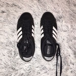 Brand new black adidas shoes.